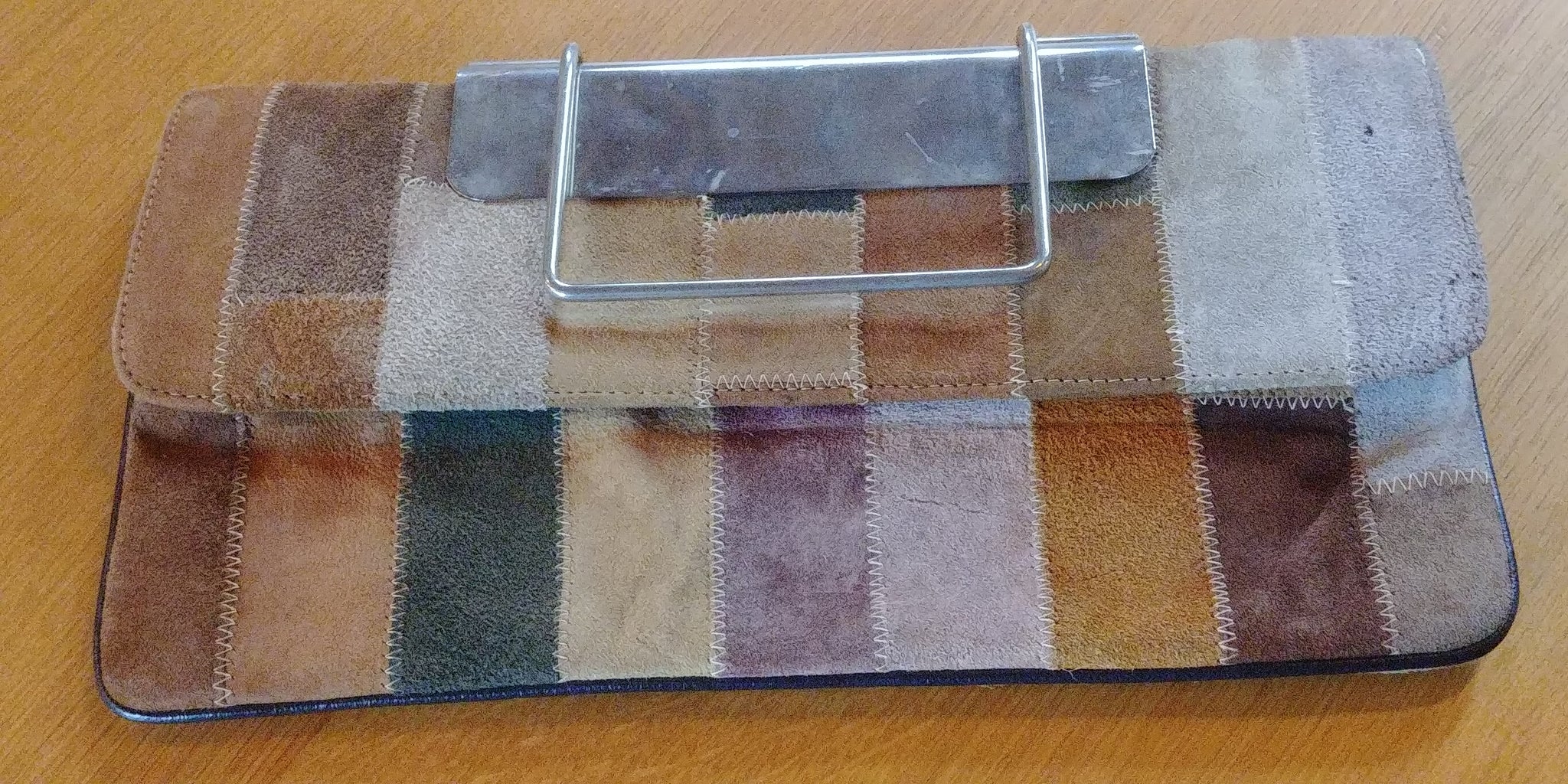 Pochette patchwork en cuir